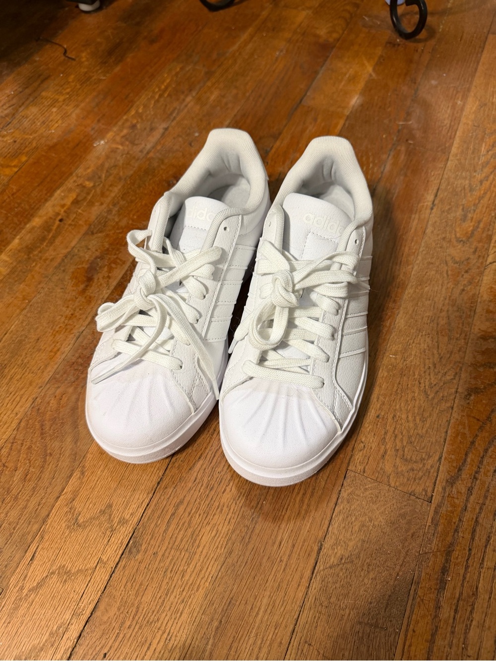 adidas women’s All-White Low-Top Sneakers